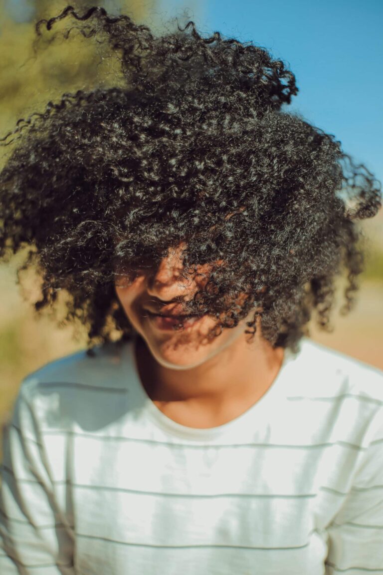 woman with hair blowing in her face