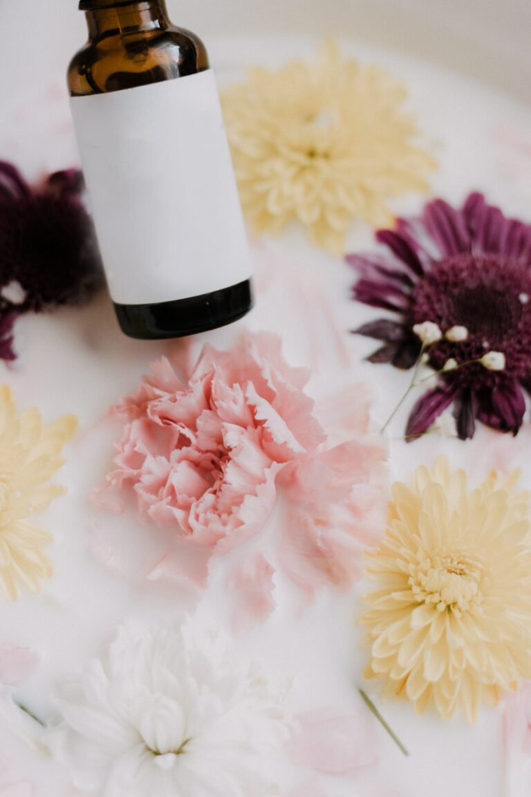 glass bottle and flowers